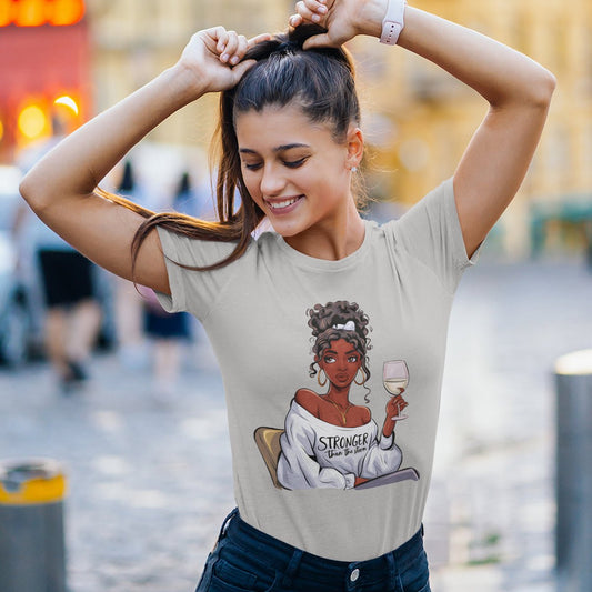 Be Stronger Than Storm Women’s Basic Softstyle T-Shirt in black with bold print